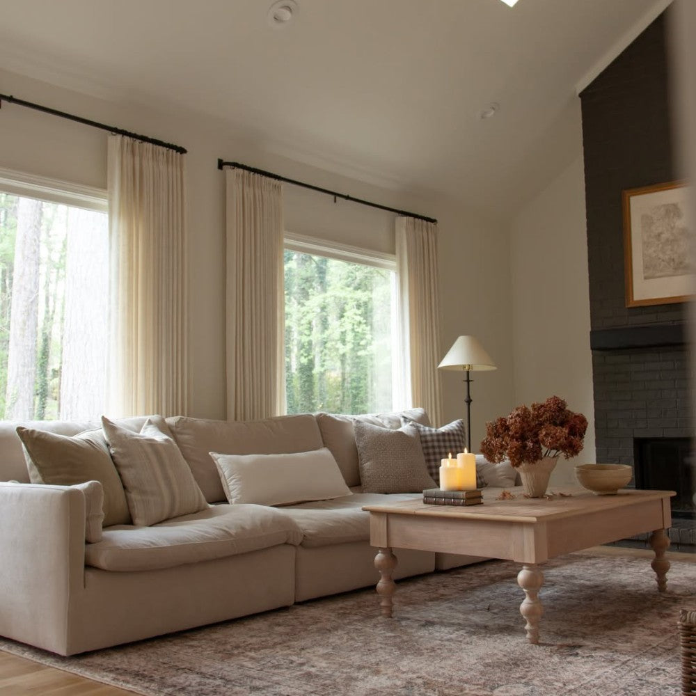 Premium custom pinch pleat linen curtains installed in a modern American living room