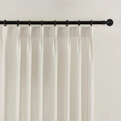 Hand-tailored pinch pleat header detail on premium custom linen blackout curtains