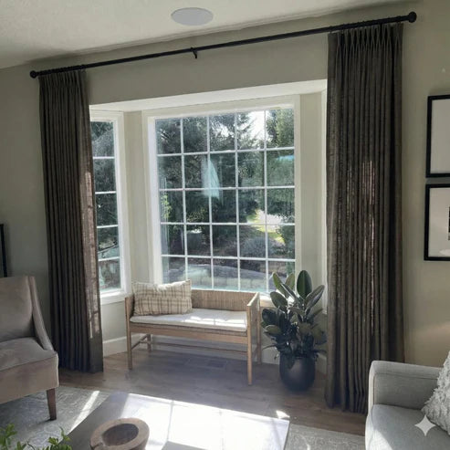 Vibrant Cinnabar pinch pleat linen curtains with handcrafted folds