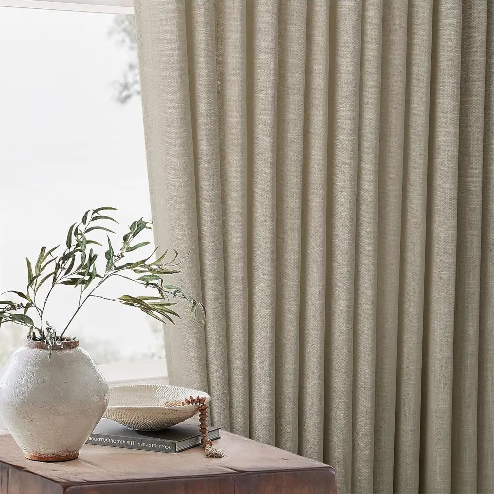 Close-up view of the smooth hanging effect and elegant drape of custom Light Khaki linen curtains.