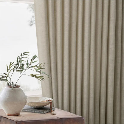 Close-up view of the smooth hanging effect and elegant drape of custom Light Khaki linen curtains.