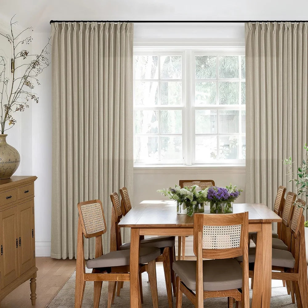 Side view of premium Light Khaki linen drapery showing the elegant hanging effect in a dining room.
