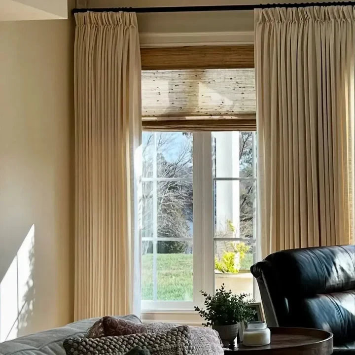Elegant Light Khaki custom linen drapes featuring a classic hook and ring style in a living room.