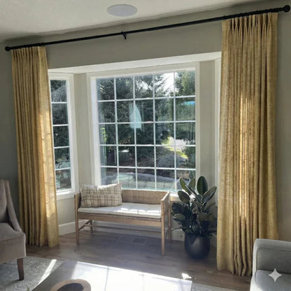 Soft Khaki Yellow pinch pleat linen curtains for a sun-drenched look