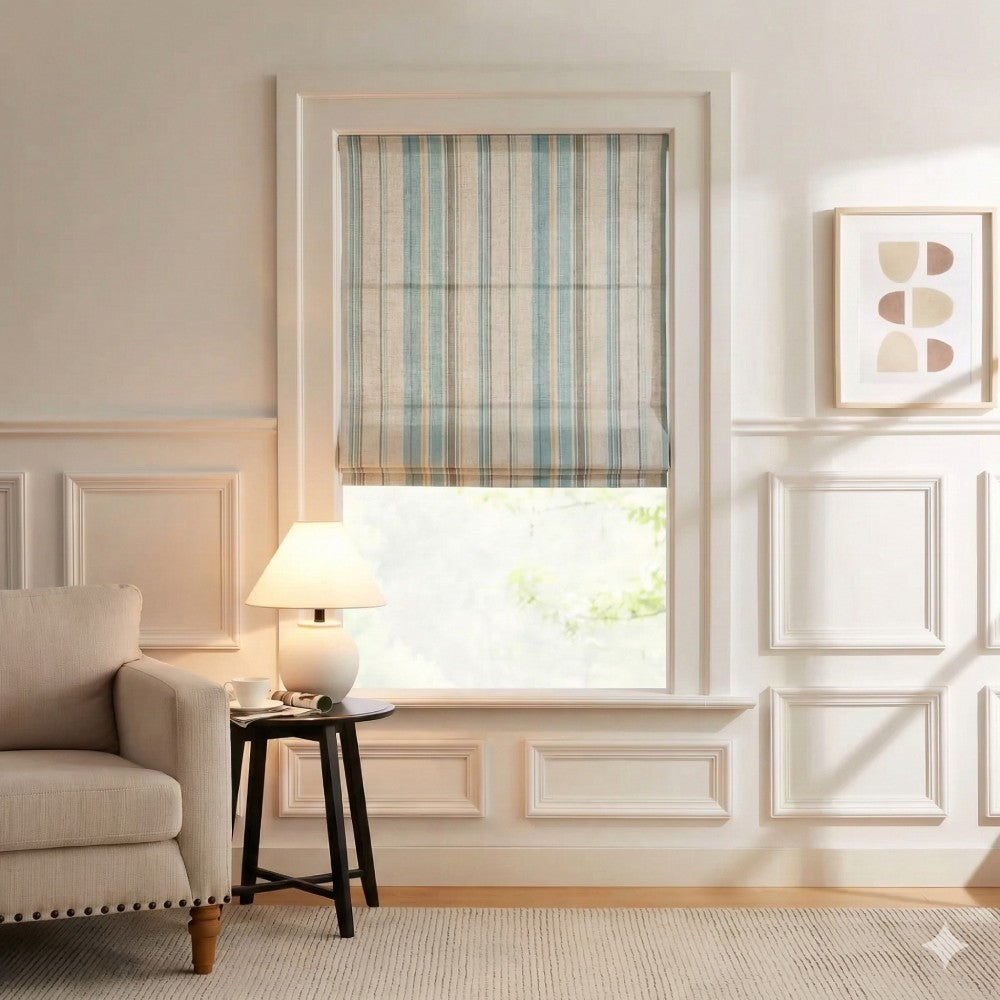 Tailored striped linen roman shade installed on a living room window above a neutral accent chair.