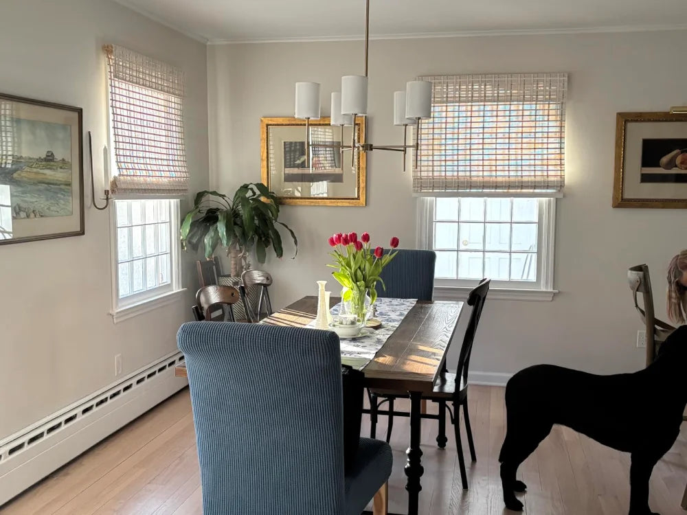 Modern farmhouse style with white indoor bamboo window treatments.