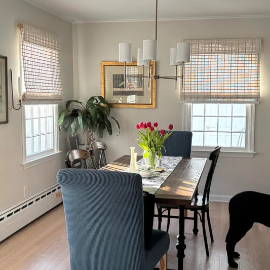 Modern farmhouse style with white indoor bamboo window treatments.