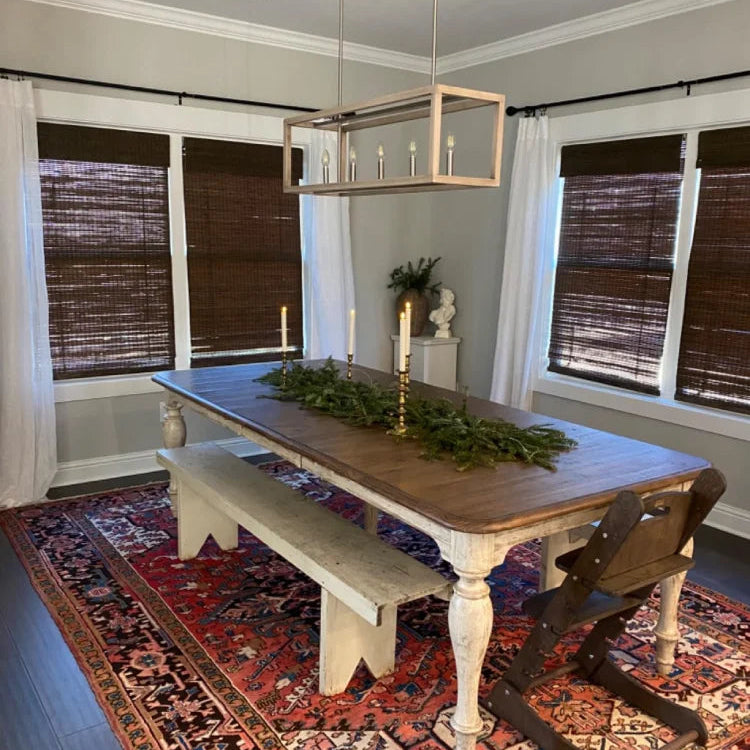 No-Drill Cordless Brown Bamboo Roman Shades in dining room, adding natural light and warmth to the space