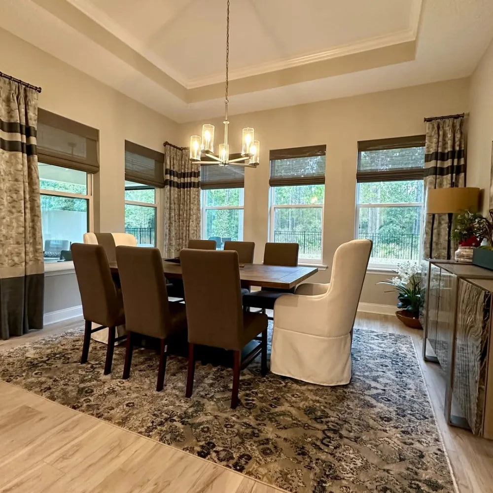 No-Drill Cordless Brown Bamboo Roman Shades in dining room, creating a warm and inviting atmosphere
