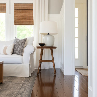 No-Drill Cordless Brown Bamboo Roman Shades, filtering sunlight and maintaining privacy in the living room