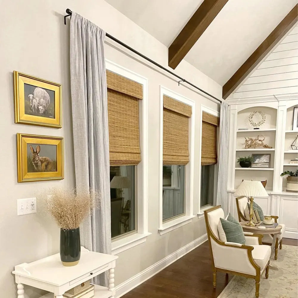 No-Drill Cordless Brown Bamboo Roman Shades in living room, offering a modern, natural look