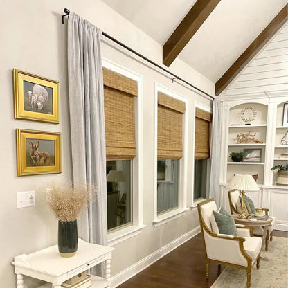 No-Drill Cordless Brown Bamboo Roman Shades in living room, offering a modern, natural look