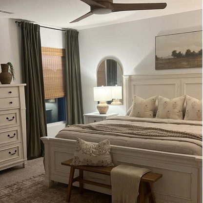 No-Drill Cordless Natural Bamboo Roman Shades in bedroom, providing a cozy atmosphere with light filtering