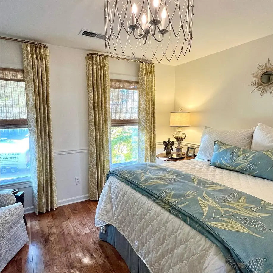 Close-up of No-Drill Cordless Natural Bamboo Roman Shades in bedroom, featuring smooth, natural bamboo texture