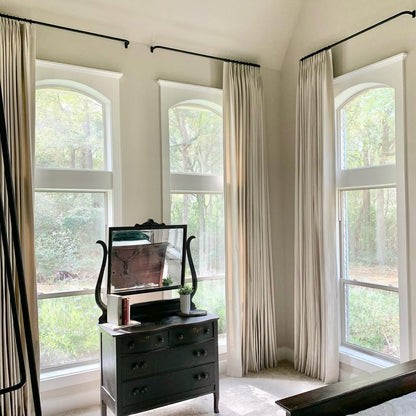 Sand Beige custom linen blackout curtains providing a serene and private bedroom view