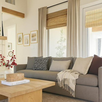 Clean and simple living room setup with light-textured bamboo shades.
